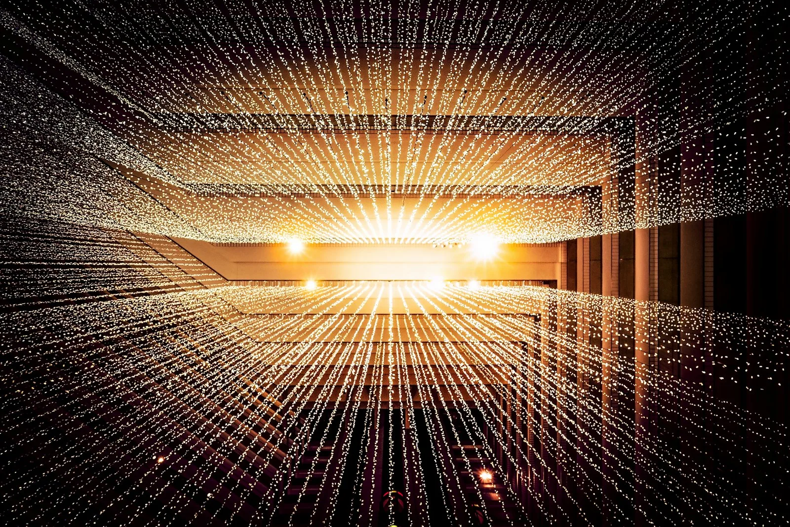 Abstract tunnel of glowing data points converging toward light