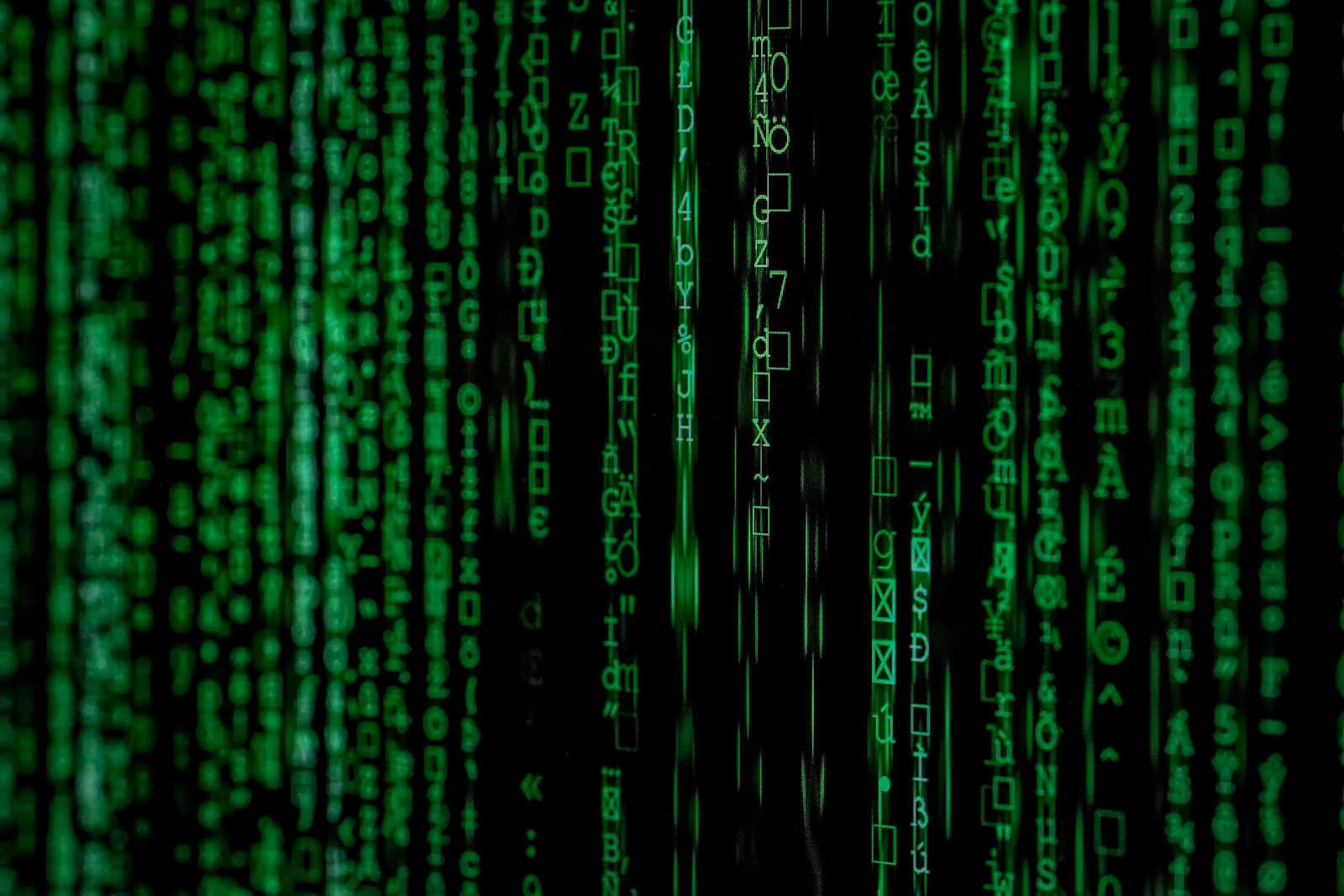 Cascading green code on a dark screen